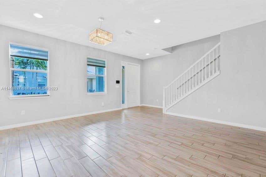 Photo of 3973 Poinciana Ln #1, Hollywood, FL 33021 (MLS # A11468037)