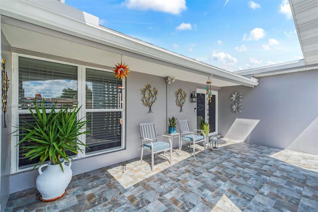 Photo of 9201 NW 21st Mnr, Sunrise, FL 33322 (MLS # A11890817)