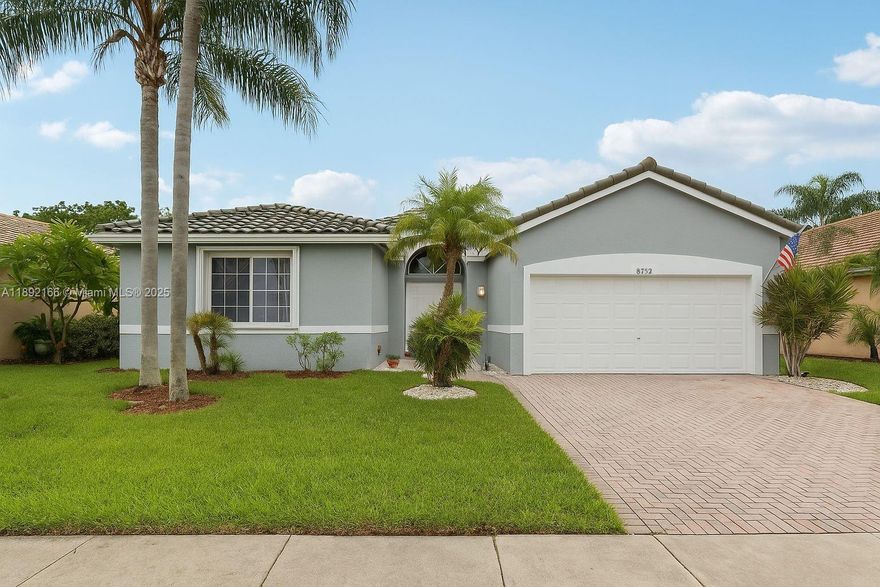 Spacious, meticulously maintained home in a gated community with pool and cabana. New roof in 2021 and complete accordion shutters. Porcelain tile throughout with bamboo wood floors in the primary. Large eat-in kitchen with newer stainless appliances, open to a bright great room and separate dining area. Split bedroom plan with oversized primary suite offering two walk-in closets with custom built-ins and a gorgeous updated spa-style bath with whirlpool tub, walk-in shower with bench, makeup vanity, and chandelier. Enjoy relaxing or entertaining on the large covered screened patio. HOA covers lawn and landscaping for low-maintenance living. Ideally located in Woodmont Country Club with restaurant, golf, and social activities open to the public.