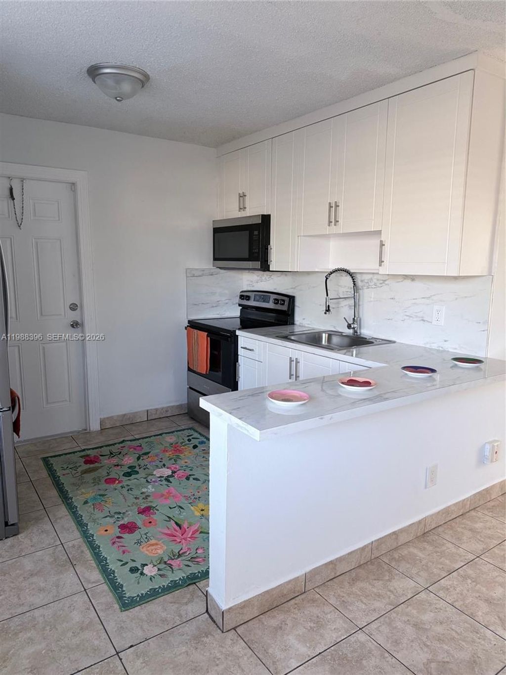 Photo of 4658 Myla Ln #4658, West Palm Beach, FL 33417 (MLS # A11988396)