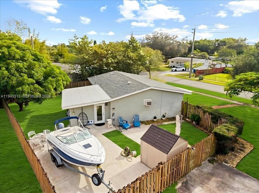 Welcome to the South Florida lifestyle you’ve been waiting for. This beautifully upgraded **3-bedroom, 2-bath corner-lot home** sits on a generous **9,000 sq ft lot** in the heart of Fort Lauderdale—offering style, privacy, impact-resistant safety, and rare outdoor space that truly sets it apart.
From the moment you arrive, the property feels expansive. With **three gated entrances**, a **dedicated concrete boat pad**, and a fully usable yard, this home delivers something incredibly hard to find: space for your boat, toys, vehicles, or future pool—without sacrificing curb appeal or comfort.
Inside, the home features a warm and inviting layout with multiple living areas, perfect for everyday living and entertaining. The **chef-inspired kitchen** is the showpiece of the home, featuring **rich wood cabinetry**, **granite countertops**, **sleek granite backsplash**, and a stunning **oversized island** that makes cooking, hosting, and gathering effortless.
Natural light pours in through the **full impact windows**, enhancing the beauty of every room while providing superior storm protection, energy savings, and peace of mind. A **fairly new roof** adds even more value and longevity.
The primary suite is spacious and well-located for privacy, while the additional bedrooms offer flexibility for family, guests, or a home office. Both bathrooms are clean and functional.
Step outside and discover the true magic of this property:Room for a Boat & a pool.