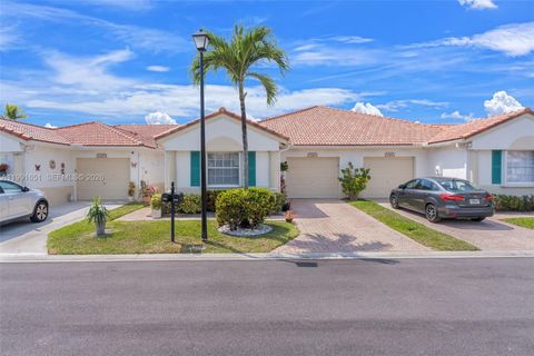 Photo of 15465 Lake Magnolia Place, Delray Beach, FL 33484 (MLS # A11991651)