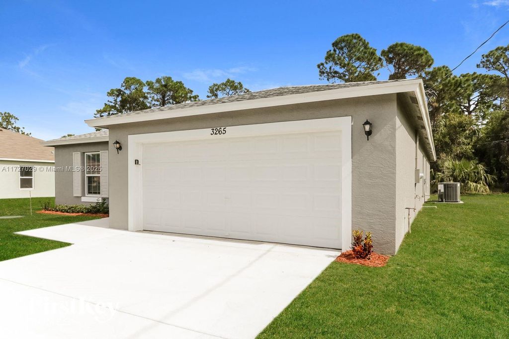 Photo of 3265 SW Fillmore St, Port Saint Lucie, FL 34953 (MLS # A11727029)