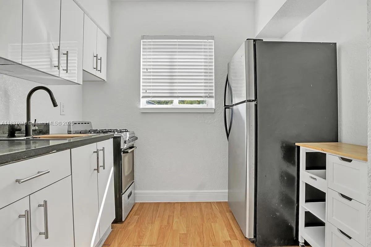 Spacious 2-bedroom, 1-bath apartment located in the heart of North Beach. This charming unit offers a functional layout with ample natural light and comfortable living areas. Just a short walk to the beach, parks, shops, and local dining. Conveniently situated near public transportation and only minutes from Normandy Isle and Surfside. Pets welcome – bring your furry friends! Ideal for those seeking a walkable, beachside lifestyle in a vibrant and growing neighborhood. WATCH VIDEO TOUR