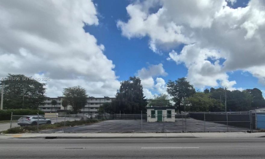 Rare opportunity to acquire a high-intensity commercial corner on Miami's NW 27th Ave corridor. This 10,668 SF dual-folio (30-2134-002-0220, 30-2134-001-0150) site is 100% vacant and move-in ready, featuring a 720 SF office hub, full perimeter fencing, and dual-street access. Ideal for an owner-user dealership, fleet operator, or national retail developer seeking maximum exposure