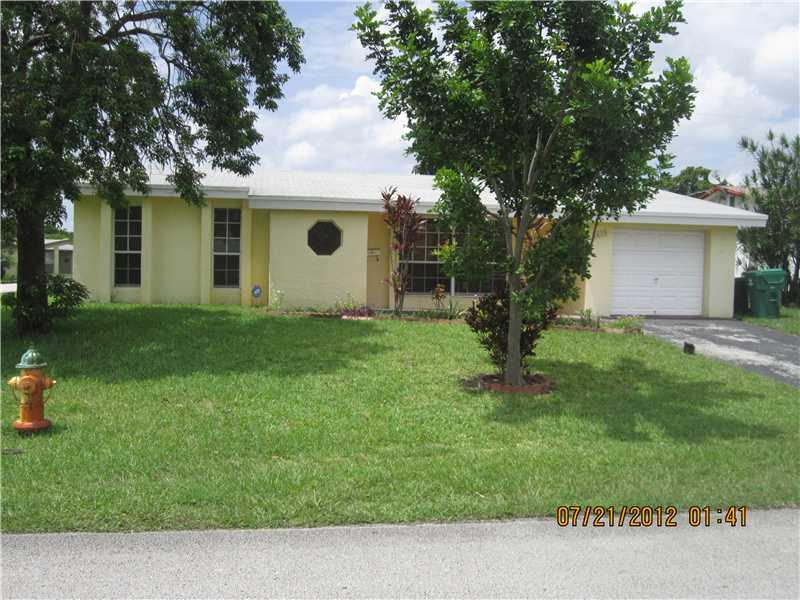 ATTRACTIVE 3BR 2BA HOME WITH LOTS OF UPGRADES LOCATED ON A LARGE CORNER LOT IN THE HEART OF MIRAMAR....NEW KITCHEN WITH GRANITE COUNTER TOP AND STAINLESS STEEL APPLIANCES...TILED FLOORS AND MODERN BATH DONE WITH GREAT TASTE...SIT BACK AND RELAX IN THE SCR EENED PATIO AND ENJOY THE LARGE BACKYARD....OVERSIZED LOT WITH ROOM FOR POOL....LIGHT FIXTURE IN FORMAL DINING ROOM AND DISHWASHER ARE NOT INCLUDED IN THE SALE....