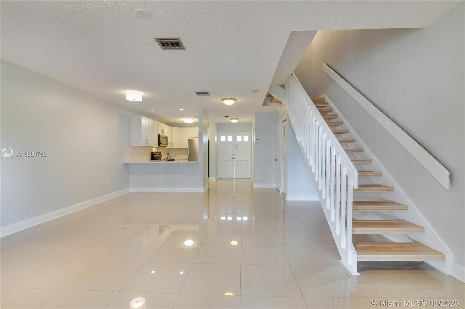 Renovated 2 story waterfront townhouse at Oyster Cove in North Miami Beach east of US-1.
First floor features spacious living/ dining area with view of water, porcelain floors, new open kitchen with quartz counters, stainless steel appliances, and all new half bath with W/D in unit. Beautiful open staircase to 2nd floor with 2 X- large bedrooms and full bath. Lots of closets! Private outdoor terrace directly on the water overlooking canal/ boat docks/ back yard and pool. Peaceful community on quiet cul-de-sac street!. 2 Parking spaces. Both A/C & hot water heater just 2 years old! New roof just completed! low HOA. This waterfront home is a hidden gem just minutes from Biscayne Blvd, Aventura, Sunny Isles, and the beaches!. Available now for owner occupant or investor.
