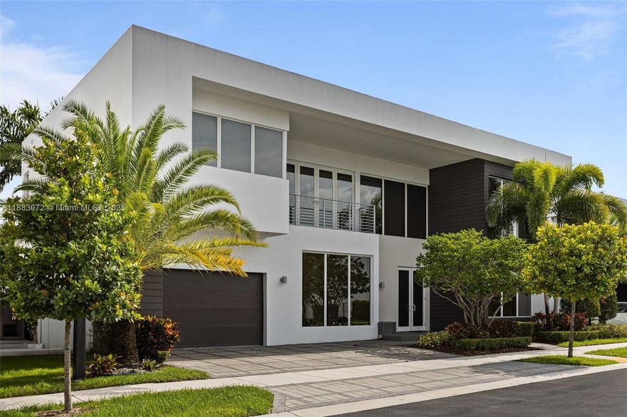 Introducing an exquisite contemporary luxury home with 5 bedrooms, 5.5 bathrooms, a versatile den. This modern
gem boasts a chef’s kitchen with premium quartz countertops, Viking appliances, a wine cooler, and custom Italian
cabinetry. Enjoy expanded kitchen cabinetry, a sparkling heated and salt-watered pool, a pergola, a summer
kitchen, and travertine marble flooring with LED lighting in the backyard. The home features a Smart Home
Package, upgraded porcelain flooring, crystal and stainless steel stair railing, and an epoxy-painted garage. It is
located in a private gated community and has access to a state-of-the-art clubhouse. An alkaline water system is
included.