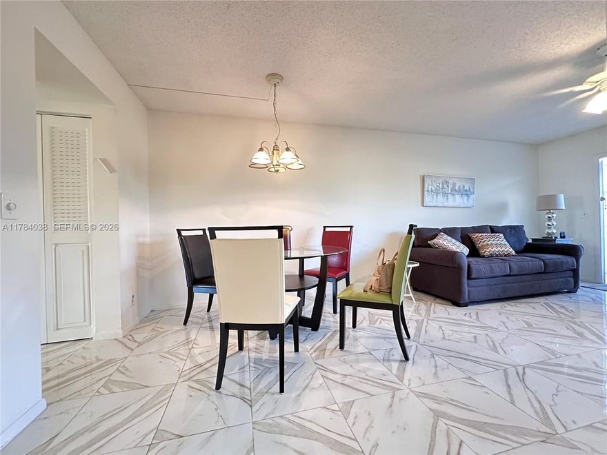 Amazing condo 1 bedroom and 1.5 baths with a long screened balcony overlooking a lake. Ceramic floors throughout the property and laminate in the bedroom. Updated kitchen and bathrooms. A designated storage room. Elevator in the building. Common laundry room on each floor. A community pool. Century Village 55 community. Amenities include: walkway throughout the complex. The Clubhouse has a full gym, theater with weekly shows and movies, pools, ping pong tables, card room, bingo, tennis courts, jacuzzi, shows, classes, clubs, library, meeting rooms, party room, fitness center, billiard room, and more. Free bus service inside the community and outside to the shops and various routes. Maintenance includes: water, cable, internet, exterior insurance, community pool. Can be rented after closing
