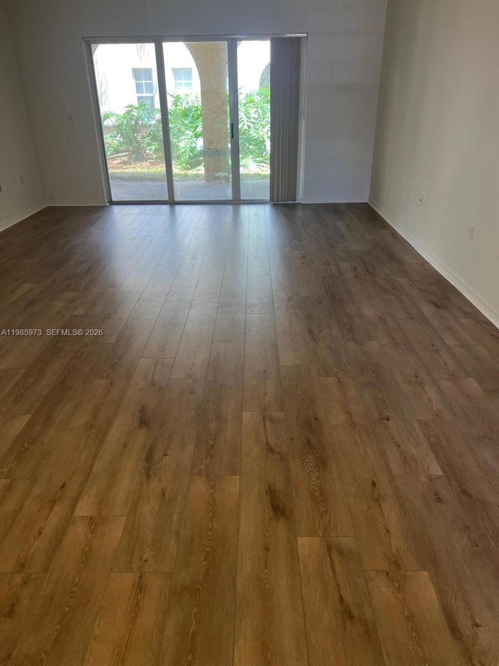 Photo of 2486 Centergate Dr #102, Miramar, FL 33025 (MLS # A11985973)
