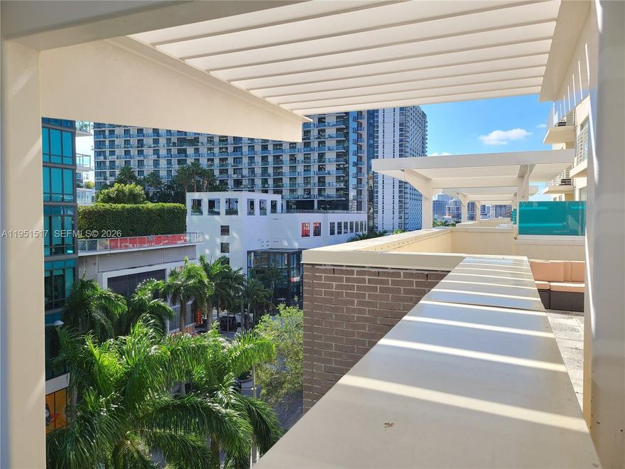 Amazing Midtown Miami Neighborhood.  Many conveniences and amenities at street-level.  This large residence offers over 1230sqft, with large living-room/dining and full kitchen combination.  Brand NEW AC and HOT WATER HEATER.  The Apt is located on the 5th floor and has a very large Terrace off the living-room.  Ideal for outside dining with 6x or more people.  Two over-size bedrooms, walk-in master bedroom closet and custom cabinetry.  Midblock Condominium allows for short-term rentals, min 2 nights....excellent investment opportunity for those seeking passive income.  No Special Assessments! Apartment is Vacant.