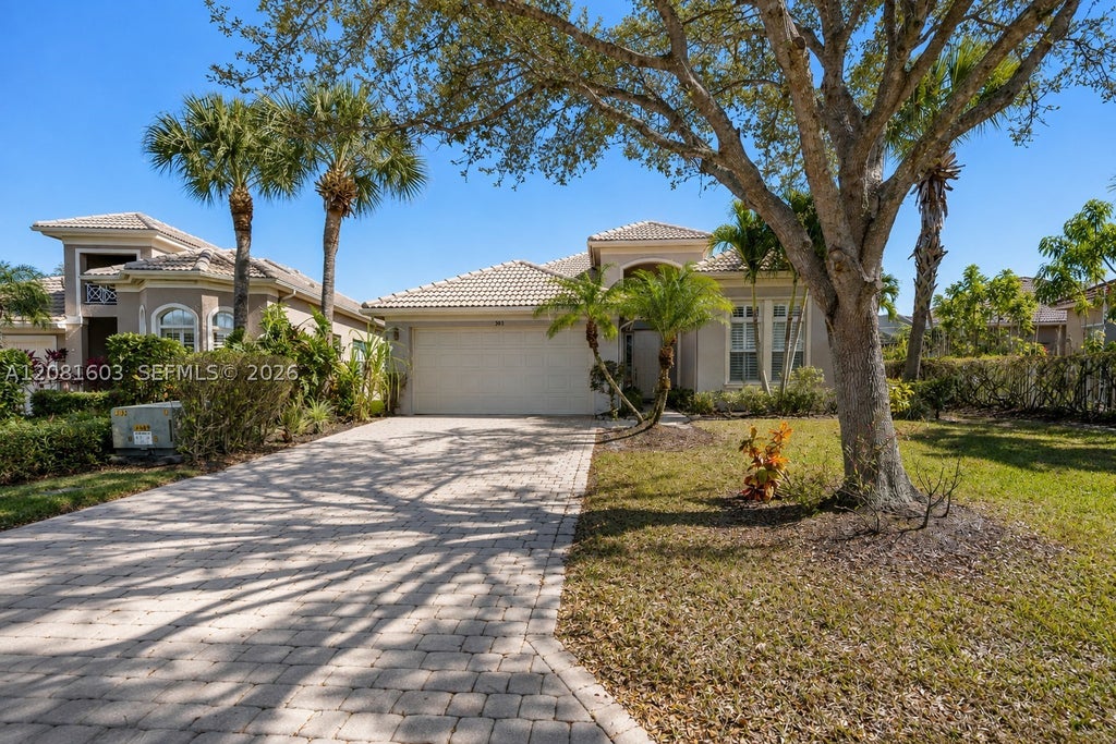 Photo of 303 NW Somerset Cir, Port St Lucie, FL 34983 (MLS # A12081603)