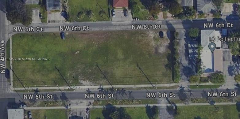 Vacant lot, Excellent location, Mixed Use Optional / Transit oriented; ideal to build up to 22 units of multifamily, commercial, or mixed use. Exceptional opportunity for developers, builders, and investors, situated in the rapidly growing & Re-developing area at the heart of Pompano Beach, just a couple blocks west of Dixie Hwy and North of Atlantic Blvd. This Property is overloaded with potential due to its location within the Transit-Oriented (TO) district which opens the site to a multitude of development possibilities and creativity for those with vision to endure on the future of this New Pompano area.