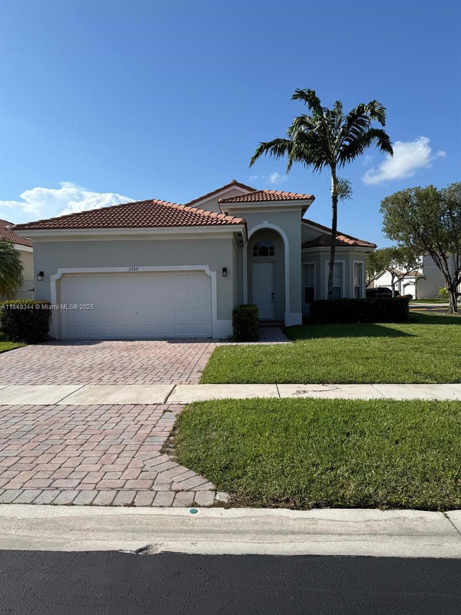 Beautifully updated single family home, located on a corner lot, in the desirable, Gated, and secure Waterstone community in Homestead. 2 Car Garage, Stainless steel appliances, updated bathrooms, ceramic tile flooring throughout, and blackout shades in bedrooms. Must see to appreciate. Easy to show