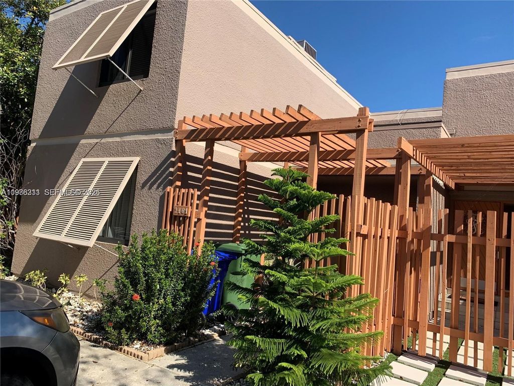 Photo of 1461 NW 113th Ave, Pembroke Pines, FL 33026 (MLS # A11986311)