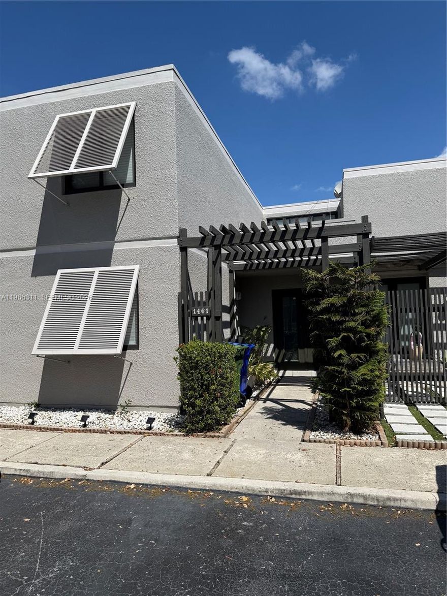 Must see this 3 bedrooms 3 baths townhouse with 1 full bedroom and bath on ground floor. In Villas Lakes in the heart of Pembroke Pines. Stainless steel appliances. Impact window. Tile throughout the first & second floor. Large patio perfect for entertaining. 24 hour security patrol, close to Pembroke Lakes Mall, hospital & shopping plazas. Amenities include Cable TV, Big size pool, tennis courts, basketball courts, 2 assigned parking spaces in front of unit and plenty of Guess Parking.