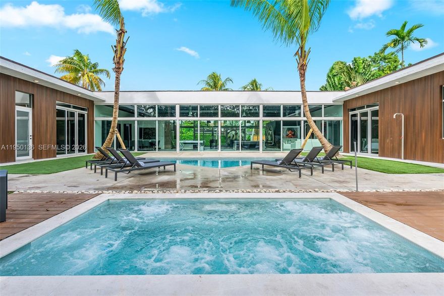This residence boasts 15 foot ceilings, tons of natural light and a great open floor-plan. Home features S/S
appliances, updated bathrooms, and a modern industrial design. Pool and jacuzzi over lush and spacious
landscaping. Corner double lot with 17,593 sq ft. Ideal location for all that Miami has to offer.