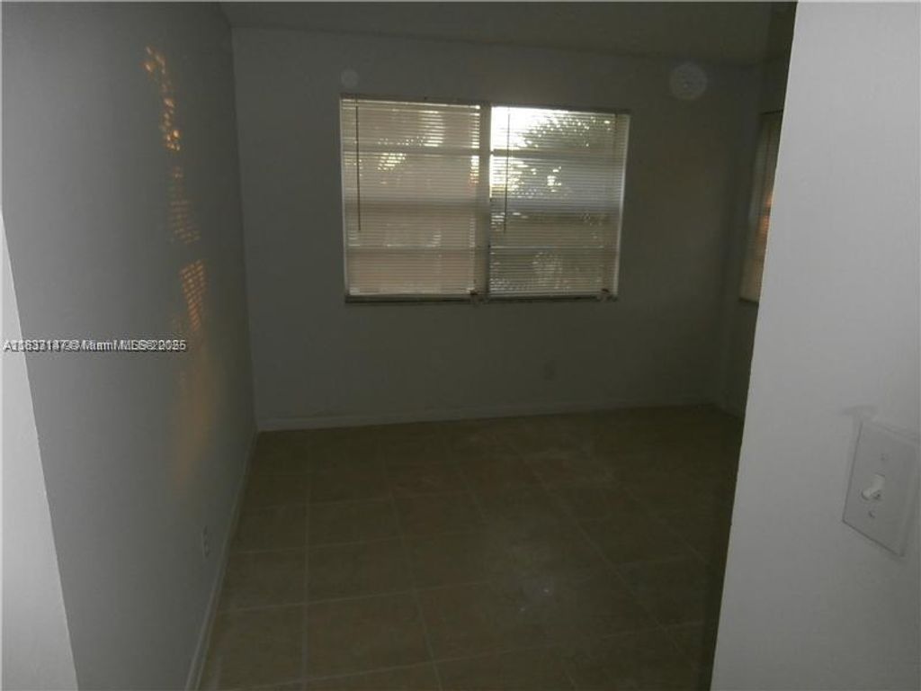 Photo of 95 NE 41st St #O230, Oakland Park, FL 33334 (MLS # A11833147)