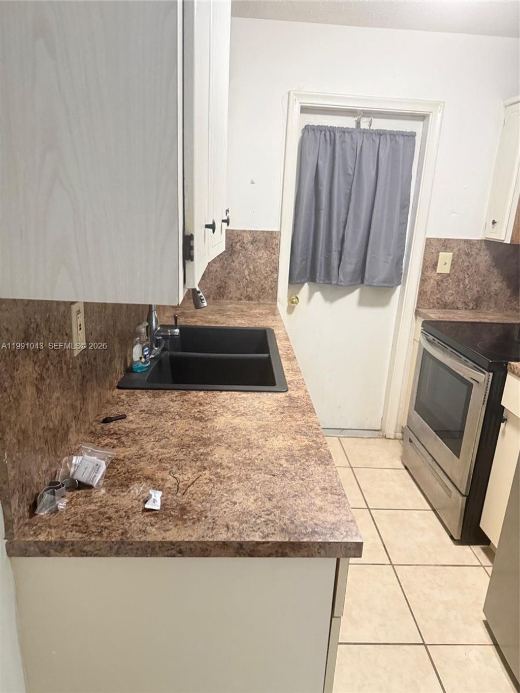 Photo of 1231 NW 19th Ct #2, Fort Lauderdale, FL 33311 (MLS # A11991043)