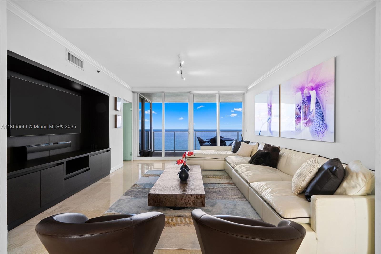 WELCOME TO LUXURY LIVING AT IT'S FINEST IN THE PRESTIGIOUS OCEAN TWO IN SUNNY ISLES BEACH. THIS BEAUTIFULLY APPOINTED 3-BEDROOM,4,5-BATHROOM RESIDENCE OFFERS A SPACIOUS 2,440 SQ FT OF ELEGANT LIVING SPACE WITH A DESIRABLE FLOW-THROUGH LAYOUT, ALLOWING FOR BOTH BREATHTAKING OCEAN AND INTRACOASTAL VIEWS.
ENTER THROUGH YOUR PRIVATE ELEVATOR INTO A BRIGHT AND MODERN SPACE DESIGNED FOR COMFORT AND STYLE. THE UNIT COMES WITH TWO ASSIGNED PARKING SPACES AND EVERY INCH REFINED COASTAL LIVING.
