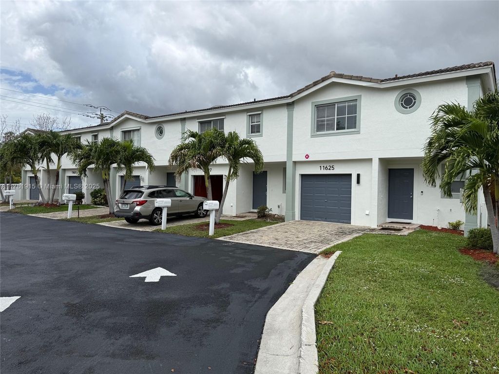 Photo of 11627 NW 23rd Ct #11627, Coral Springs, FL 33065 (MLS # A11781915)