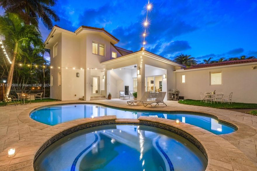 Welcome to Watersong! This magical, rare, five-bedroom secluded East Miami Shores mid-century modern pool home flows like a poem and will be music to your ears! Enter through a welcoming front porch into multiple cascading living areas with high ceilings, a designer eat-in kitchen and dining, opening through sliding doors to a grand vaulted covered terrace, lush fenced private gardens and sparkling pool and spa with soothing fountain feature—perfect for entertaining or relaxing. Great open-flow plan with five split spacious bedrooms (three are full ensuites). Fantastic features: modern designer kitchen and baths; hardwood floors; newer concrete tile roof; impact windows-doors; upgraded electrical-plumbing; and new smart-zoned AC system. All in one of The Shores’ most prestigious locations!