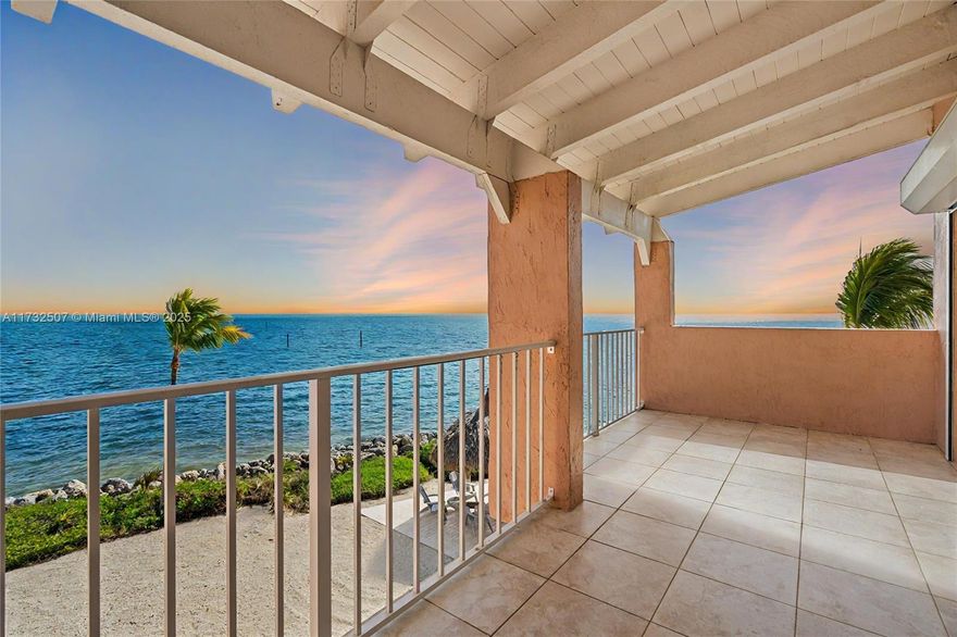 Amazing Ocean View from this corner oceanfront three-story townhome with deeded 50ft slip just steps away. Indulge in the vibrant ocean colors of turquoise blues and greens from every room. Awaken to awe-inspiring sunrises accompanied by refreshing ocean breezes. This hidden gem has the best views in the exclusive Key Largo Yacht Club with the boat slip just steps away. Convenience, peace and quiet are yours in this private community of only 24 units. Remodeled and turn-key, ready to move in. Offered furnished. Impact windows & doors in addition to shutters. Multiple balconies in front and back. Covered parking for 2 vehicles. For boating enthusiasts, a 50-foot deeded boat slip with a 4-post lift provides direct ocean access from your private dock, conveniently located behind your garage.