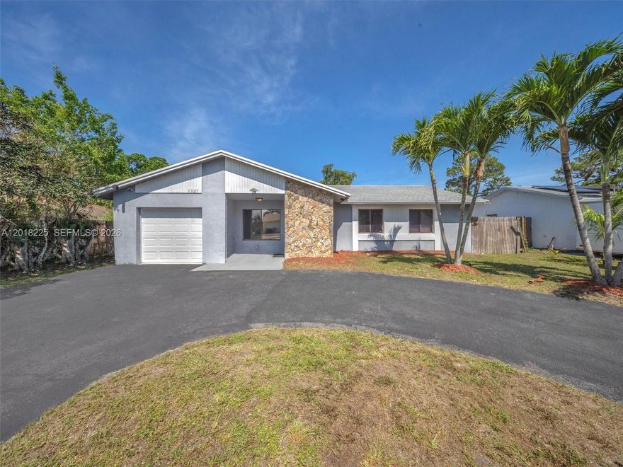 Welcome to your sweet home in Margate, Florida. This beautiful 3-bedroom, 2-bathroom home with a one-car garage has no rear neighbors, providing greater privacy. Enjoy a circular driveway with ample parking space for your family and guests. Inside you will find ceramic tile floors throughout, a spacious combined living and dining room, and an enclosed Florida room perfect for an office, playroom, or relaxation area. Step out into the large backyard with room for a pool or garden, and mature fruit trees including an orange tree, lemon tree, lime tree, and mango tree. The roof was replaced in 2022, giving you peace of mind for many years to come. Located in the heart of Margate, close to shops, restaurants, parks, and major highways, and just minutes from Coconut Creek, Coral Springs, and the beaches. Don't wait any longer and schedule your private showing today to make this house