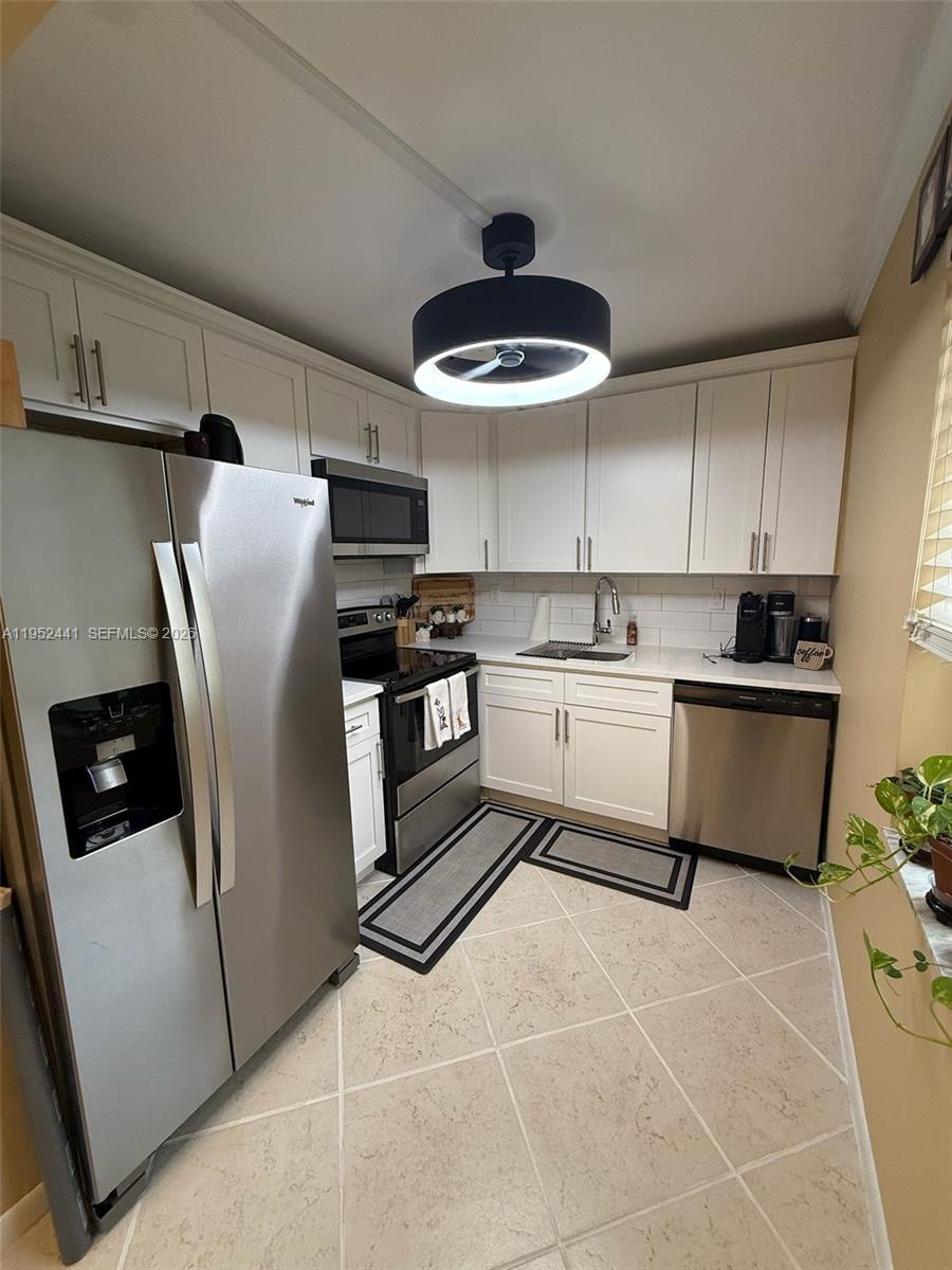 KINGS POINT BURGUNDY COND - Residential