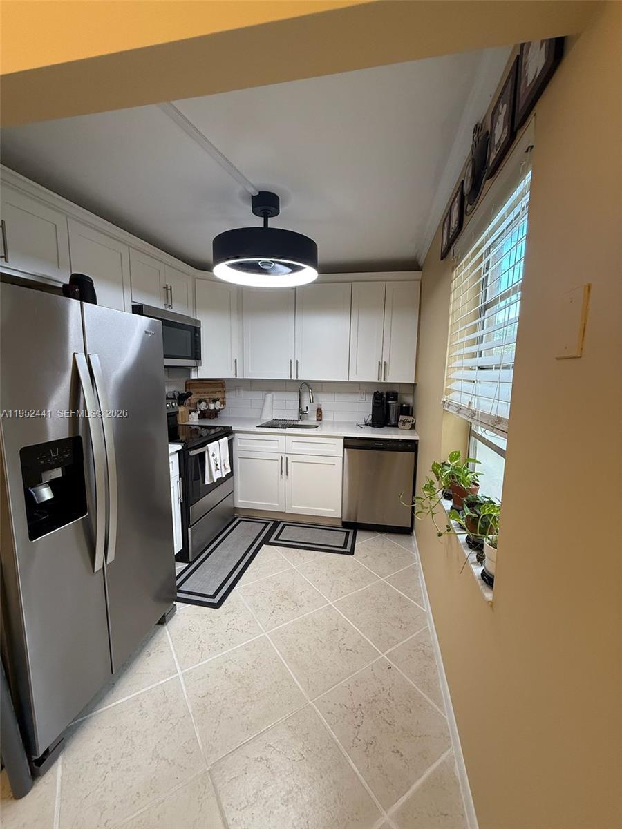 KINGS POINT BURGUNDY COND - Residential