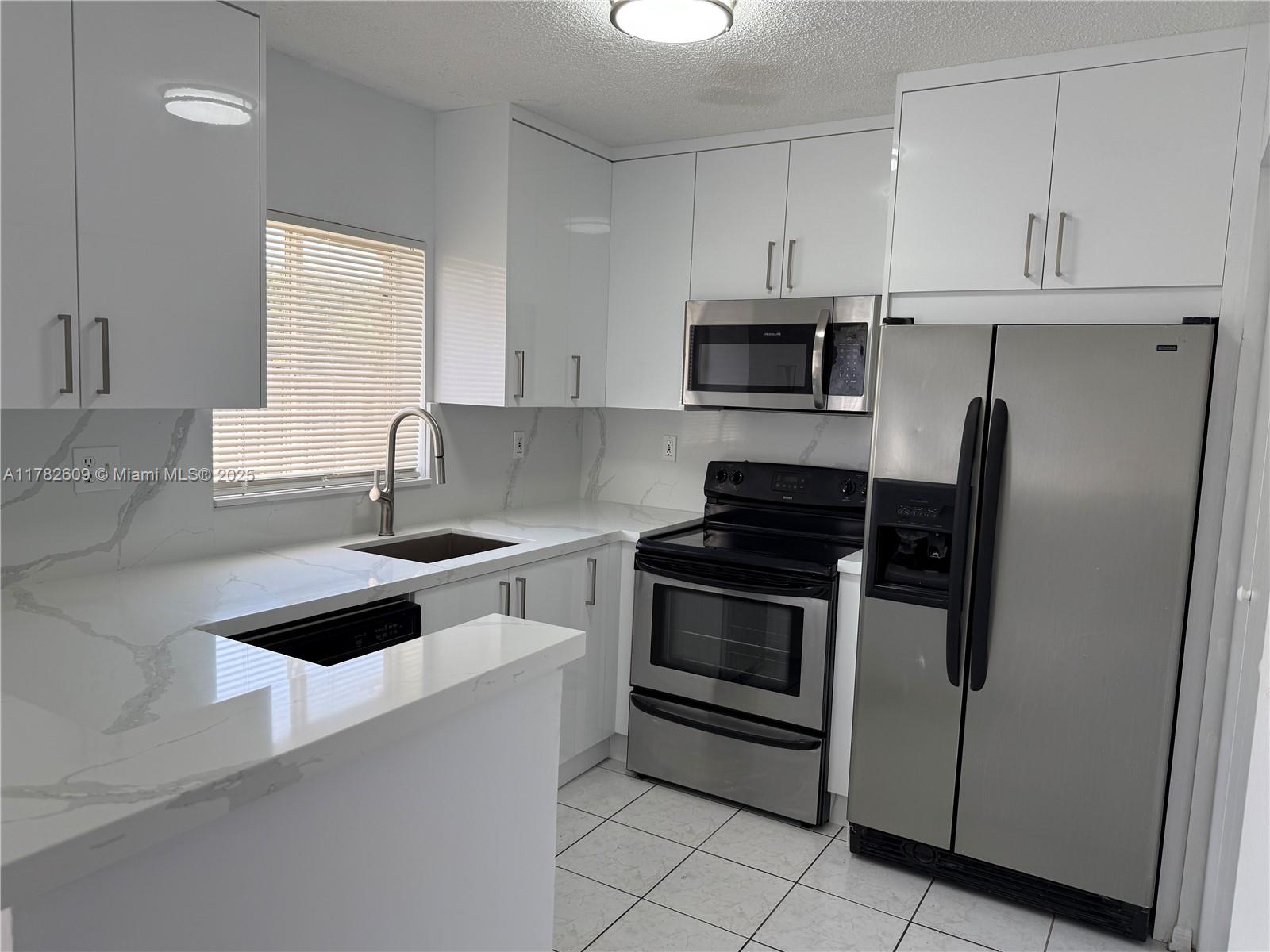 Rental Property at 15321 Sw 133rd Pl 1001, Miami, Broward County, Florida - Bedrooms: 4 
Bathrooms: 3  - $3,100 MO.