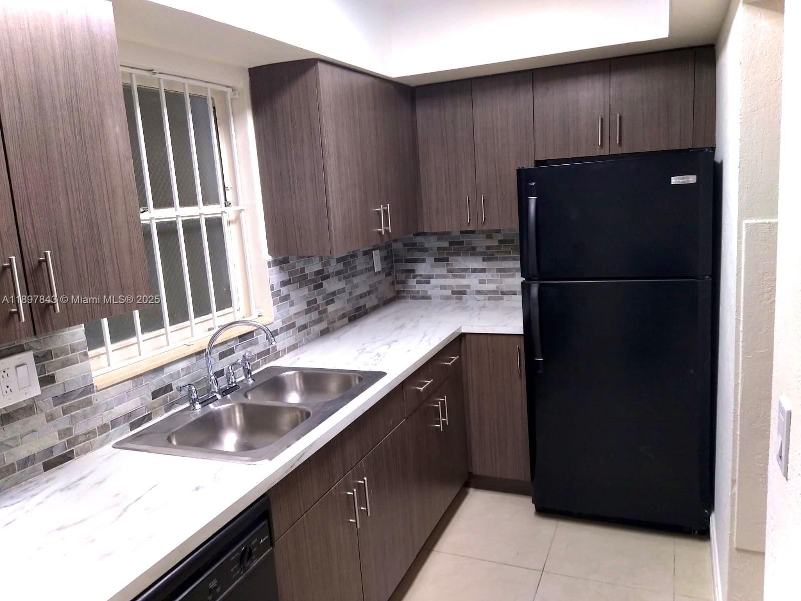 VILLAGE AT DADELAND CONDO - Residential Lease