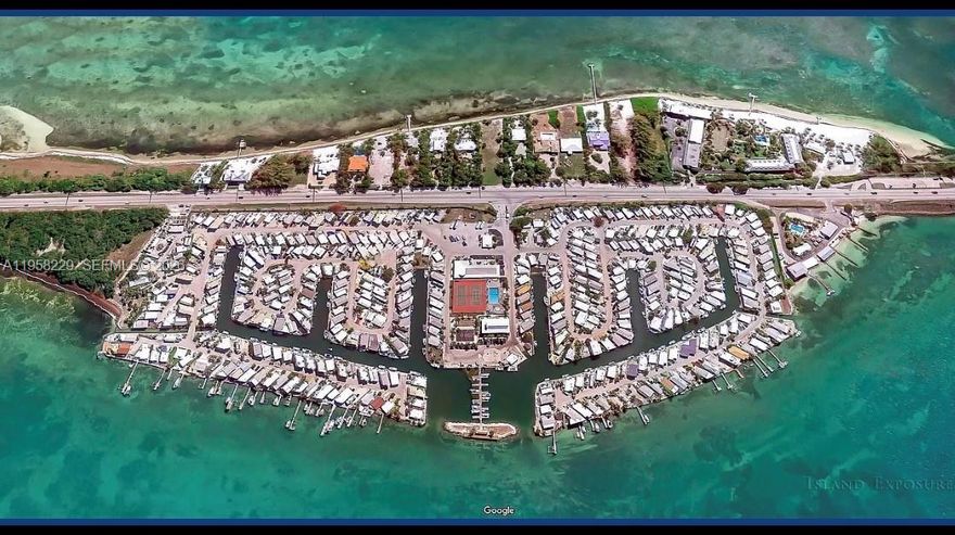 Boater’s paradise! Situated on the Gulf of Florida and just minutes from the Atlantic Ocean with two bridges to the bay, this fully furnished mobile home offers the ultimate waterfront lifestyle. The home features marine plywood flooring, recently updated electrical and plumbing, a new metal roof, and a 20-gallon water heater installed inside. Enjoy 24/7 security, a private beach, boat ramp, marina, and your own boat slip. The community amenities are endless: pool, sauna, basketball court, game room, gym, tennis, and pickleball. Convenience is key with a private gas station and store onsite, plus ample boat and car parking. Relax on the screened porch or covered patio while taking in serene water views. Minimum 28-day leasing. This is waterfront living at its finest, combining recreation, relaxation, and security in one perfect location.