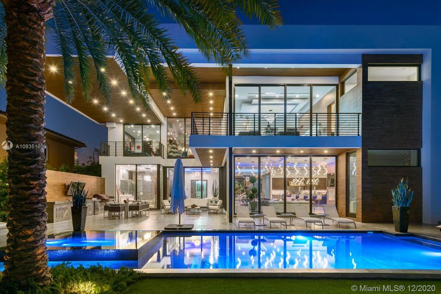 Spectacular design combined with magnificent modern finishes adorn this one of a kind waterfront masterpiece.  This stunning showplace features gourmet chef’s kitchen with state of the art appliances, luxurious owner's suite with posh spa bath, and resort style pool with summer kitchen and exterior loggia.  Dock your yacht, and enjoy all of the luxurious custom appointments including all ensuite bedrooms, private elevator, glass encased show garage and gym.  No expense spared and  available turnkey.