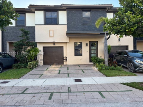 Photo of 15780 NW 91st Ct, Miami Lakes, FL 33018 (MLS # A12095663)