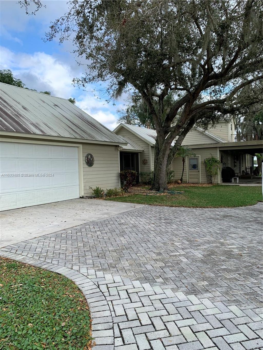 Photo of 830 SW 29th St, Palm City, FL 34990 (MLS # A11533480)