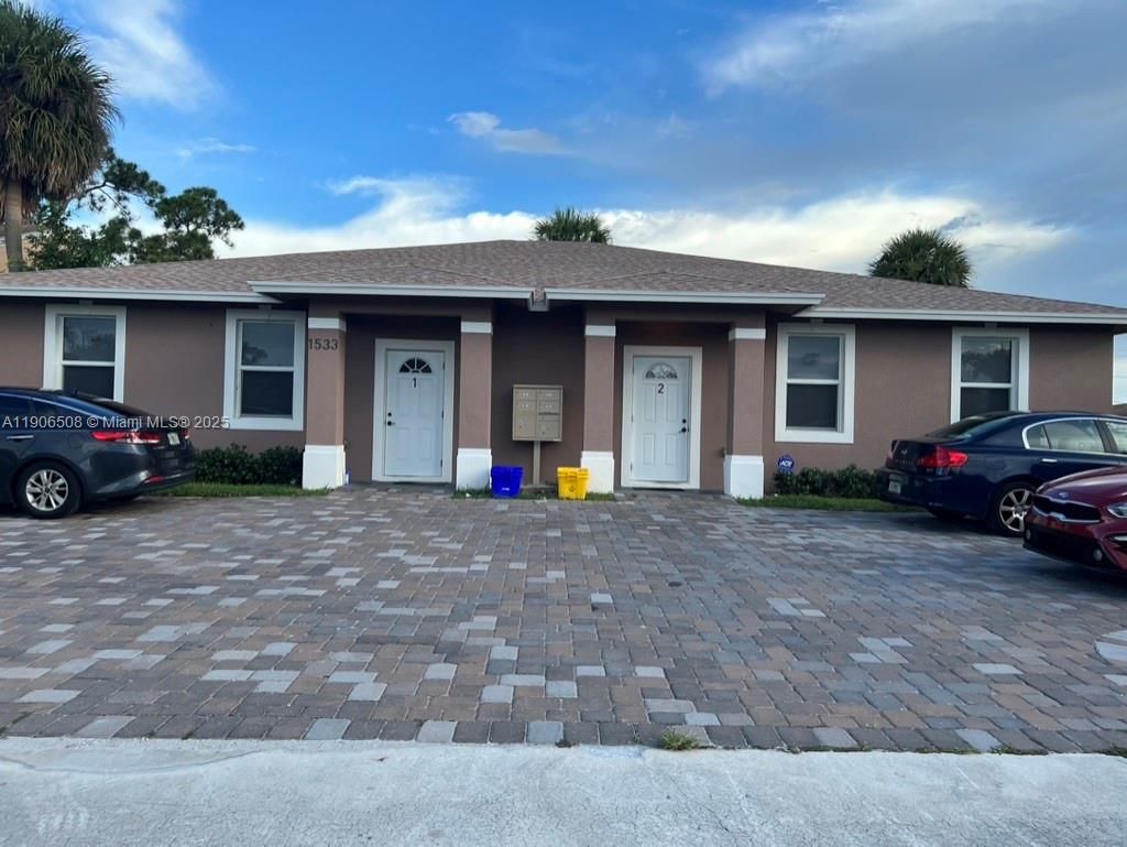 Photo of 1533 W 26th Ct #1B, Riviera Beach, FL 33404 (MLS # A11906508)