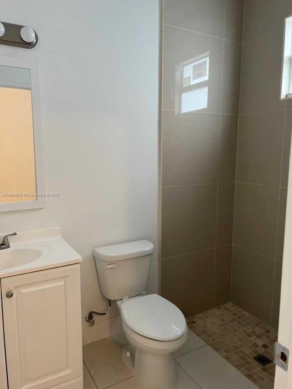 Photo of 1533 W 26th Ct #1B, Riviera Beach, FL 33404 (MLS # A11906508)