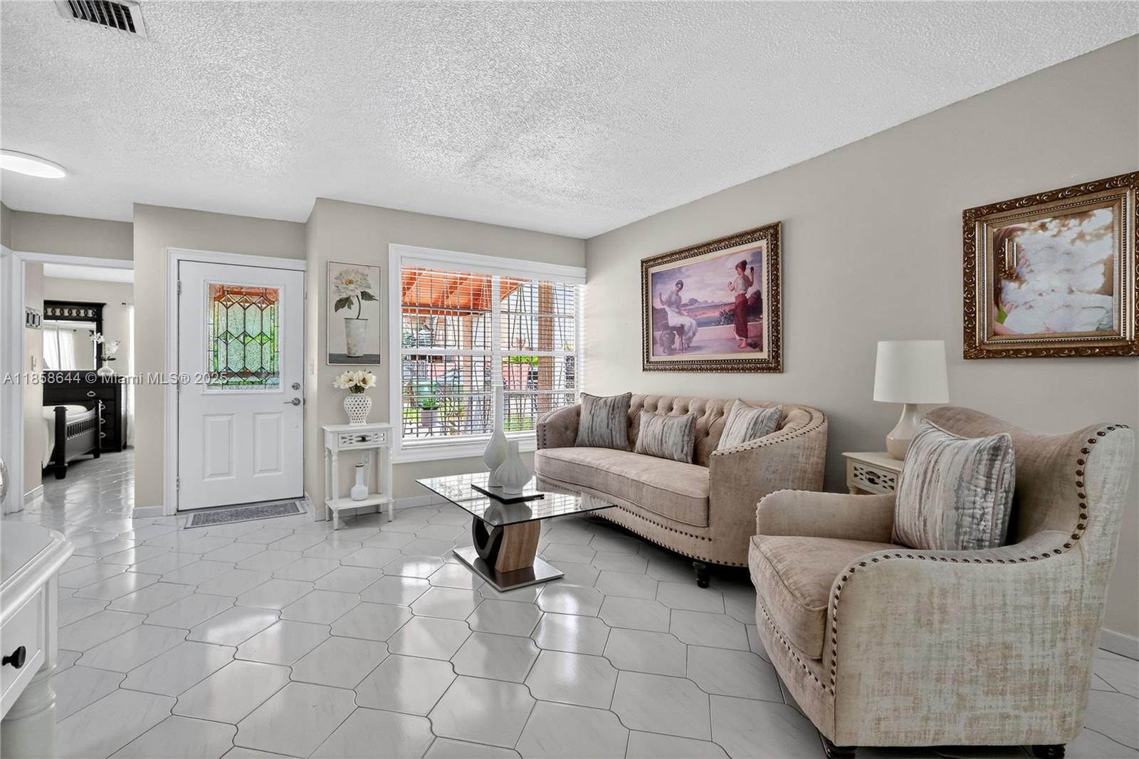 Charming Hialeah Home! This bright, beautifully maintained 3-bedroom, 2-bath residence showcases pride of ownership throughout. Features include tile flooring, stainless steel appliances, granite countertops, updated bathrooms, and a spacious patio with a covered terrace—perfect for entertaining. With ample parking and move-in ready condition, this home is waiting for its next proud owner.