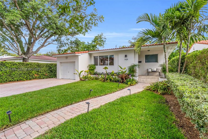 Tucked away on a quiet, tree-lined street in North Coral Gables, this updated home blends classic Gables charm with the easy indoor-outdoor lifestyle buyers are looking for. Just moments from the Granada Golf Course, morning walks, coffee runs, and tree-lined streets become part of everyday life. Inside, the open floor plan is filled with natural light and designed for comfortable living and entertaining. The renovated kitchen flows seamlessly into the main living areas, while French doors from the flexible third bedroom, perfect as a home office or den, open directly to the patio. Outside, the private patio area creates the ideal setting for outdoor dining, entertaining, or relaxing evenings at home. A 1-car garage adds both convenience and additional storage. The spacious primary suite features a newly remodeled bathroom and a large walk-in closet. Additional upgrades include impact windows and doors, PVC plumbing, EV charger, 2026 AC, and a 2016 roof. Move-in ready and centrally located near some of the best dining, parks, and amenities in the Gables.