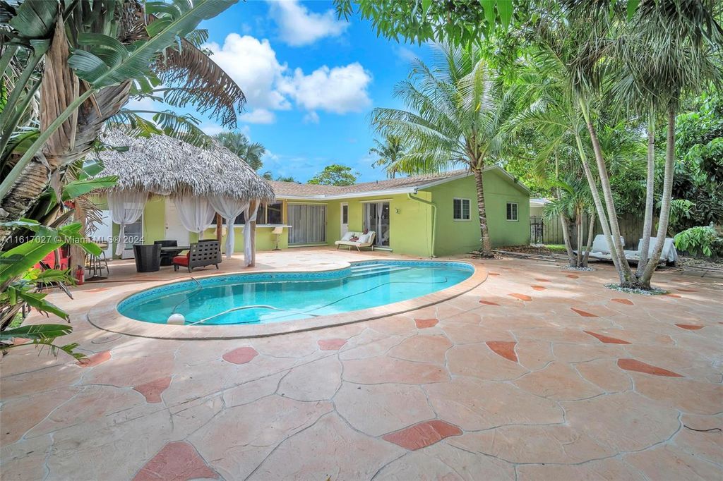 Photo of 591 NW 46th Ter, Plantation, FL 33317 (MLS # A11617027)