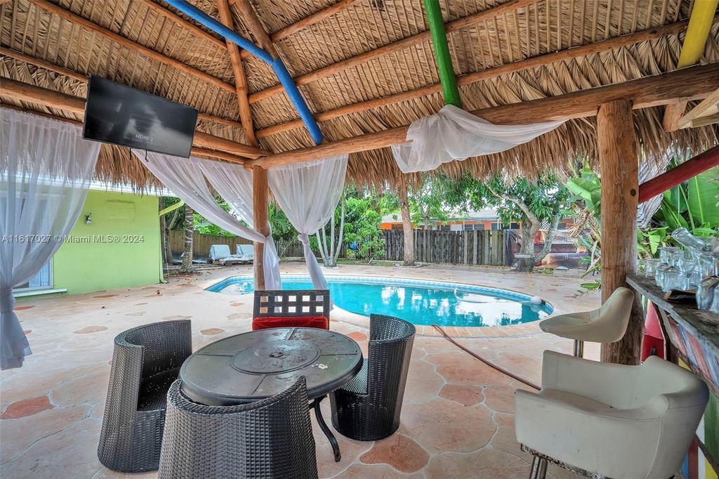 Photo of 591 NW 46th Ter, Plantation, FL 33317 (MLS # A11617027)