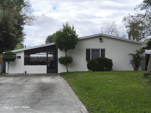 Photo of 1411 N 65th Ave, Hollywood, FL 33024 (MLS # A12112832)