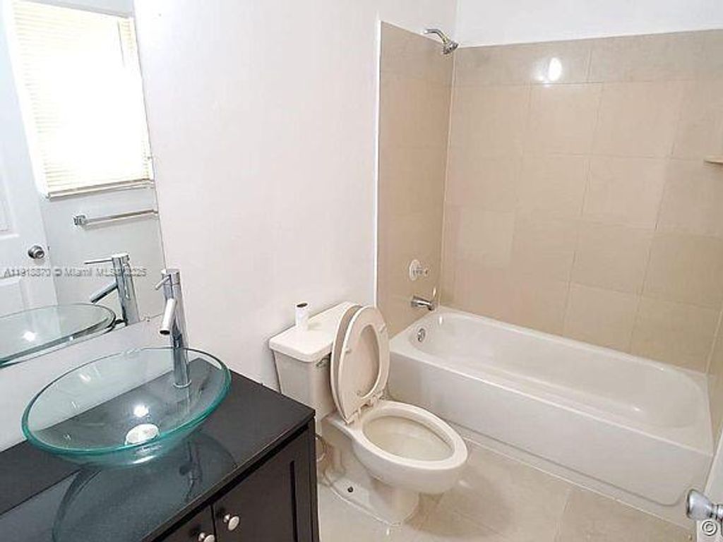 Photo of 10 Crossings Cir #H, Boynton Beach, FL 33435 (MLS # A11918870)