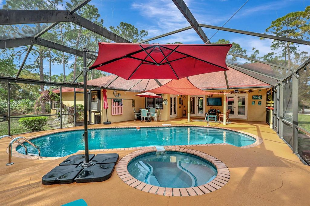 Photo of 14426 N 66th St N, Loxahatchee, FL 33470 (MLS # A11522012)