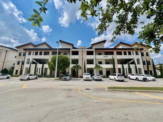 Exquisite corner condo located in the gated community of Apex at Park Central #2 in the heart of Doral. This beautiful 3rd-floor unit (with elevator access) offers 2 spacious bedrooms plus a den, 2 bathrooms, and a balcony with impact-resistant sliding doors. The master suite features a walk-in closet, and the gourmet kitchen is equipped with quartz countertops and stainless steel appliances. Washer and dryer included. Comes with one assigned parking space plus guest parking.
Enjoy resort-style living with access to a spectacular clubhouse featuring 3 pools, gym, sauna, playground, tennis courts, BBQ area, and more. Move-in ready!
