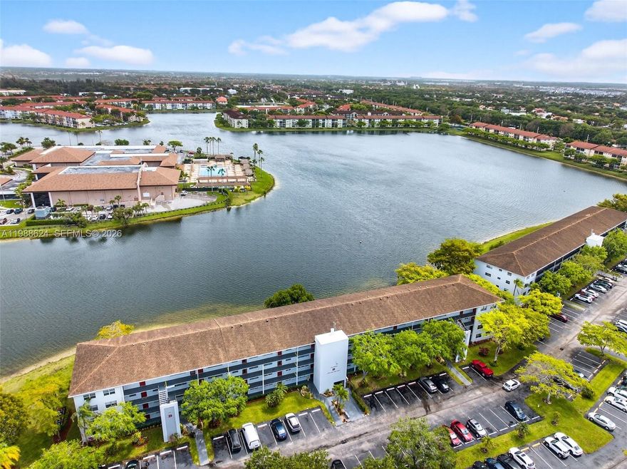 Welcome to Century Village, a resort-style community! This beautifully fully renovated 2 Bed/2 Bath waterfront condo features • Impact windows • Modern flooring throughout • Fresh interior paint • The updated kitchen offers newer appliances (2019) • Both bathrooms have been fully renovated with modern showers • Additional highlights include a 2020 A/C • Tankless water heater • Spacious walk-in closets • Assigned storage • Convenient laundry facilities on every floor • One assigned parking space #313 is included, with ample guest parking available • Low assoc. fee $713.90 total Landmark and CVPP •  Strong Reserves, No Special Assessment • Maintenance covers water, cable, and internet—adding exceptional value and ease. Located in a vibrant 55+ guard-gated community with 24/7 security, residents enjoy resort-style amenities including pools, fitness centers, tennis courts, live entertainment, hobby and craft rooms, clubs, and a convenient community bus service. One occupant must be 55+, with additional residents 18+. Minimum 650 credit score required. ESA pets welcome. Ask about the 3% down payment financing option with Valley Bank. Furniture is negotiable and can be included in the sale if desired. Experience comfort, security, and an active lifestyle all in one beautiful setting. Can rent after 2 year, no rental cap.