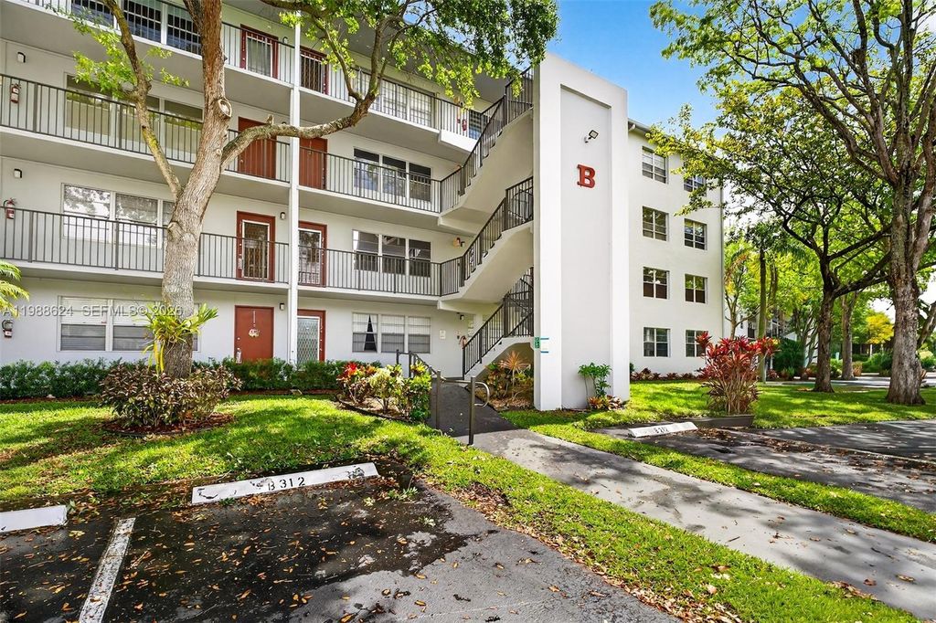 Photo of 1301 SW 134th Way #313B, Pembroke Pines, FL 33027 (MLS # A11988624)