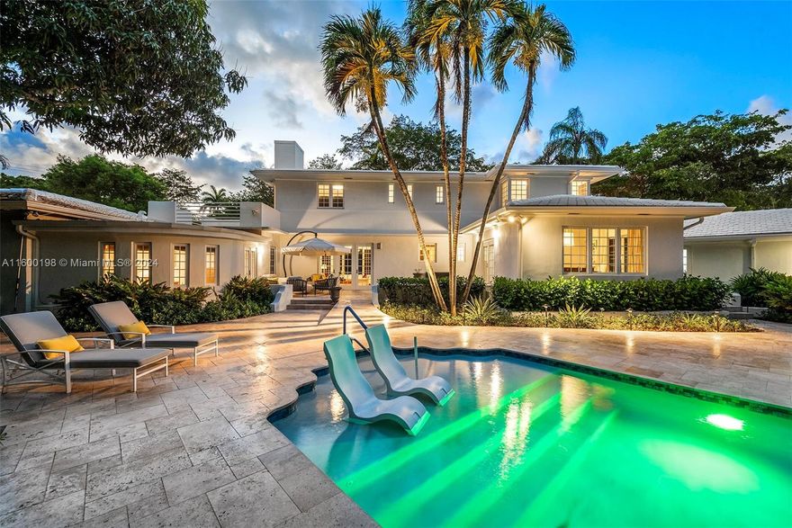 Timeless elegance meets modern luxury - this home defines artistic integration. Upon entering you are greeted by the marble staircase leading to the guest bedrooms upstairs. Downstairs, the primary suite has a private garden, California closet, and sitting room. The resort-style backyard oasis has 3 access points throughout the home with travertine tiles and luscious tropical plants. The gourmet kitchen is outfitted with Miele, Subzero, and Wolfe. The floors are a lavish variety, including Brazilian teak, slate, and porcelain. The renovated pool is saltwater + heated. The 2 AC's are new, the house has City gas, the plumbing is PVC lined, the lighting and electricity are new, the roof tiles were replaced 4 years ago, the house is equipped with Smart ADT security, and the garage is 2 cars.