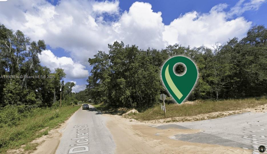 This 0.24-acre corner lot in Interlachen, Florida, is a flexible investment opportunity. Located in a quiet, growing area of Putnam County, it's zoned R-2 Residential, allowing for a permanent or mobile home, with no HOA. The level land is easy to build on, with nearby power and direct road access. Its proximity to lakes and parks offers a desirable lifestyle. The property is suitable for various uses, from building a dream home to parking an RV. This is a fast, no-nonsense transaction with no credit checks or closing costs. It's an opportunity to own a tangible asset for personal use or future investment. Owner Financing That Works For You: 33% Down – Easy monthly terms (up to 36 months). Its proximity to lakes and parks offers a desirable lifestyle.